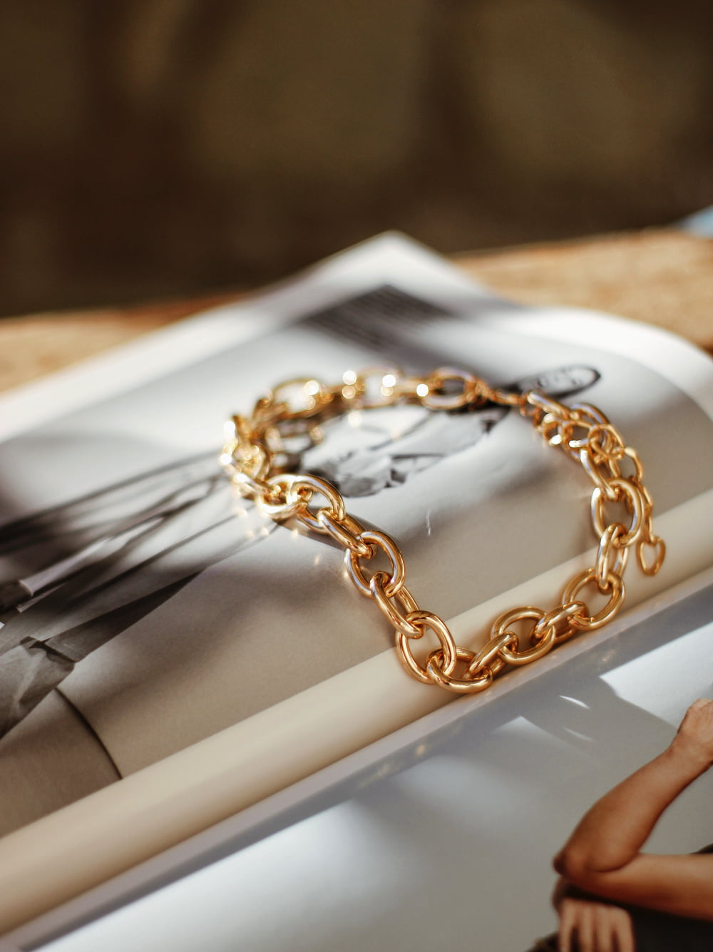 Gold Necklace on a magazine
